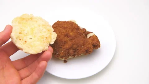 Hand taking chicken biscuit crispy deep ... | Stock Video | Pond5
