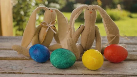 Hand taking Easter bunnies Stock Footage 137810334