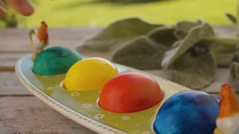 Hand taking Easter egg from an egg box Stock Footage 137809515