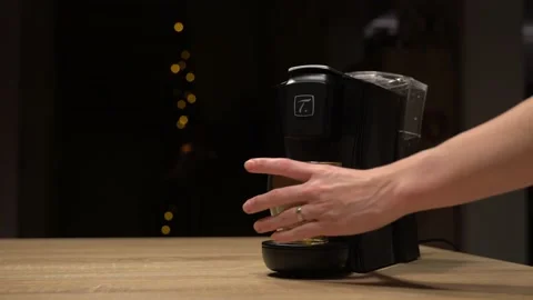Hand taking full glass of tea from machine Stock Footage 144440947