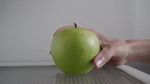 Hand Taking Green Apple From Refrigerator Close Up Side View Vídeo Stock 330244334
