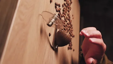 The hand is taking the grinder. Stock Footage 138498020