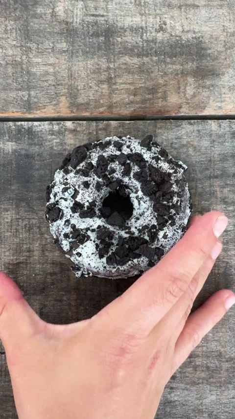 Hand Taking Oreo Donut in UGC Style Food... | Stock Video | Pond5