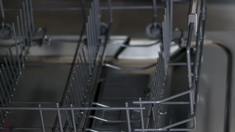 Hand taking off out plates from automatic dishwasher machine,detergent pod Vídeo Stock 213508892