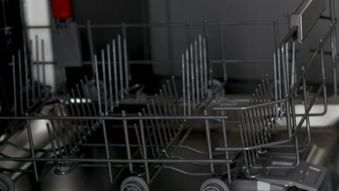 Hand taking off out plates from automatic dishwasher machine,detergent pod 動画素材 213510449