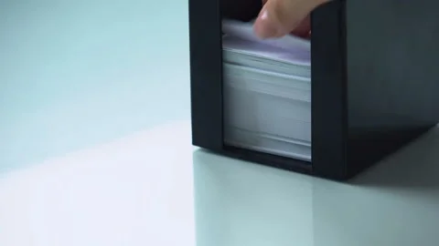 Hand taking paper from note holder, office supply organizing for work stationery Stock Footage 98822438
