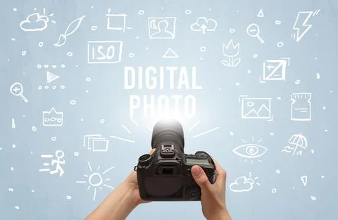 Hand taking picture with digital camera Stock Photos