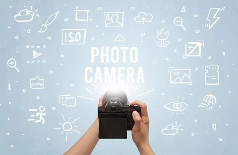 Hand taking picture with digital camera Stock Photos