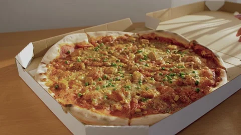 Hand taking pizza slice. Hot tasty pizza ready to eat. Stock Footage 133841317