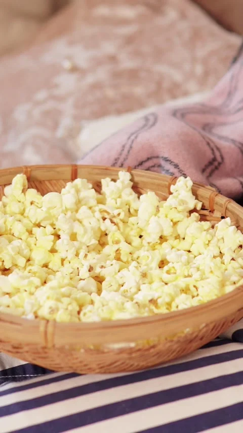 Hand Taking Popcorn from Woven Basket Close Up Stock Footage 345206170