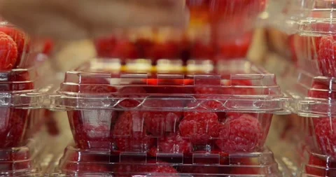 Hand Taking Raspberry Container from Shelf Stock-Footage 323829535