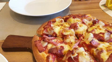 Hand taking slice of pizza, uhd 4k 3840x2160. Stock Footage 65381992