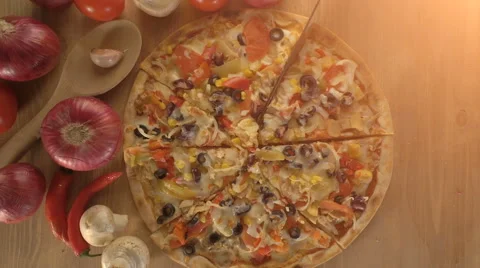 Hand taking slice of vegetarian pizza top view Stock Footage 62478932