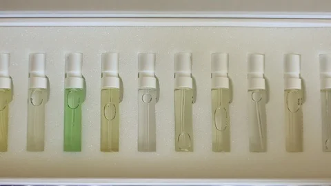 Hand taking test tubes with liquid samples Stock Footage 87224498