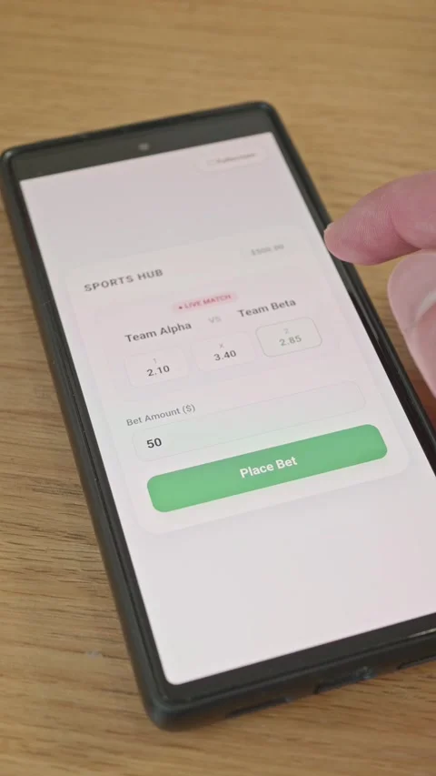Hand Tapping Screen to Place Wager on Sports Betting Mobile App, Bet Accepted Stock Footage 341860588