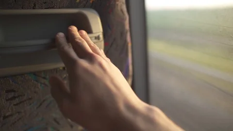 Hand tapping on the seat of a bus during a long ride Stock Footage 88730928