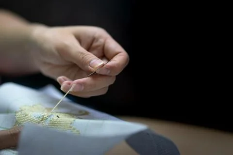 Hand thread stitching - Hobby activity. Stock Photos