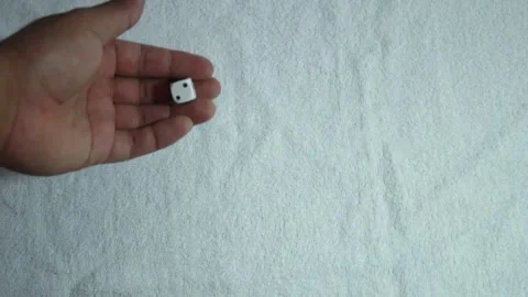 Hand throwing a 6-sided dice Stock Footage 146042140