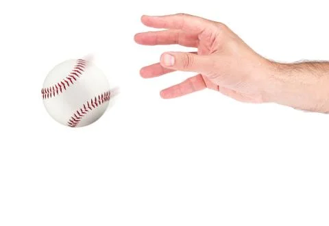 A hand throwing a baseball Stock Photos