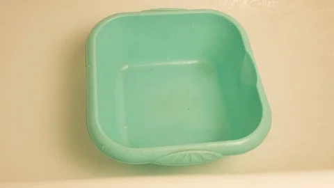 Hand throws dirty Laundry in the wash basin Stock Footage 118954009