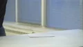 The hand throws the phone on the table. slow motion 4k or 4k+ Resolution