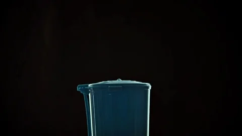 The hand throws the protective medical device into the trash. Stock Footage 126595731