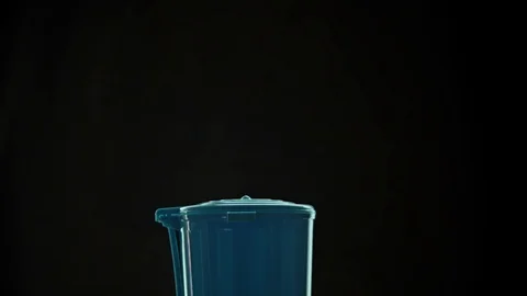 The hand throws the protective rubber gloves into the trash. Stock Footage 126595871