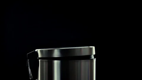 The hand throws the protective rubber gloves into the garbage can. Stock Footage 126595898