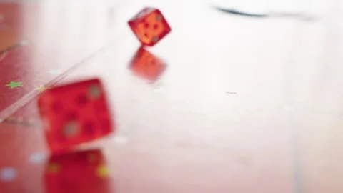The hand throws red dices on the playing field. Gaming moments in dynamics. Stock Footage 282153818
