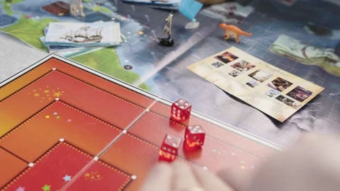 The hand throws red dices on the playing field. Gaming moments in dynamics. Stock Footage 282154503