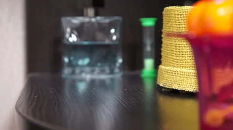 The Hand Throws Sunglasses on a Regiment. Close-Up Shot Stock Footage 66765688