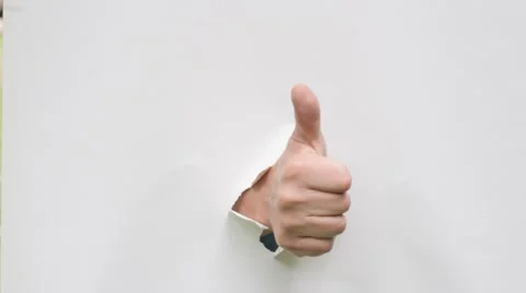 Hand with thumb up break through the canvas Stock Footage 68894965
