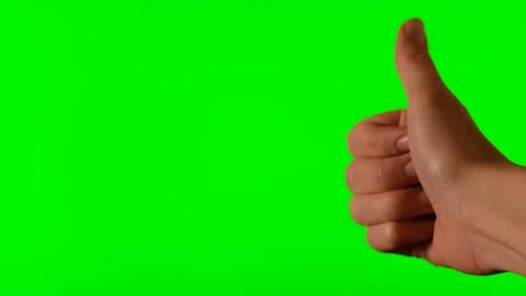 Hand with thumb up on a green background Stock Footage 131458339
