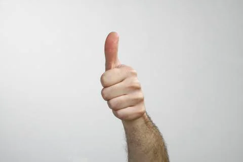Hand with thumb up isolated on white background Stock Photos