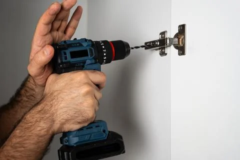 Hand Tightening Hinge With Drill Stock Photos