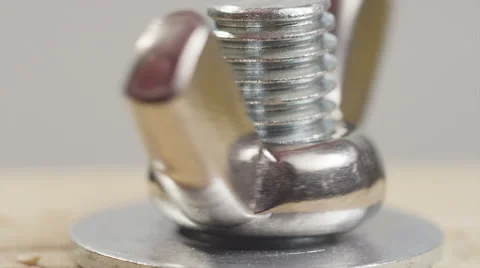 Hand Tightening a Wing Nut 库存影片 54537345