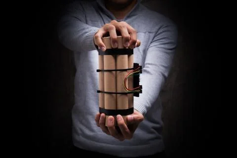 Hand with time bomb. Stock Photos
