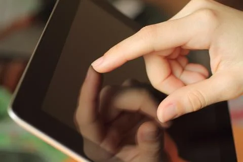 Hand toching tablet pc . Stock Photos