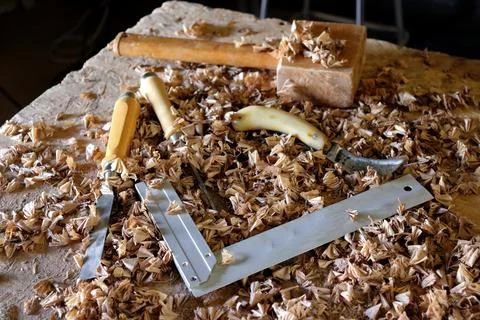 Hand tool on the background of the carpentry workshop. Stock Photos