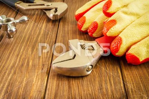 Hand tool on dark wooden background with advertising space. Stock Photos