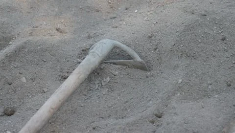 Hand tools for building in prepared cement mix. Stock Photos