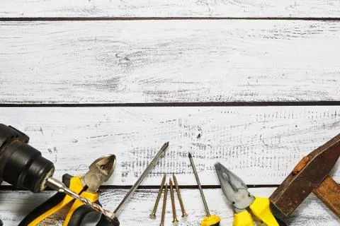 Hand tools top view on rough wooden surface Stock Photos