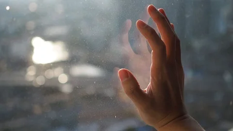 Hand touch and slide down the window Stock Footage 88772100