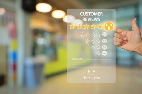 Hand touch click press to activate excellent emoji icon to survey customer sa Fotos de archivo