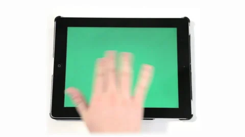 Hand touch ipad green green screen Stock Footage 36725086