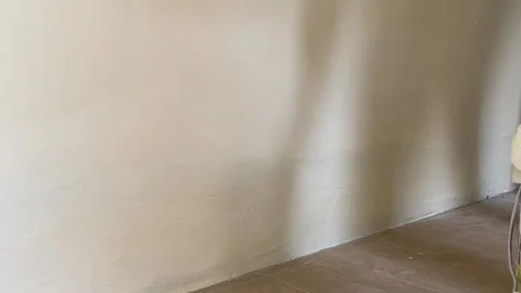 Hand Touch Up Painting Uneven White Wall With Paintbrush Stock Footage 340311565
