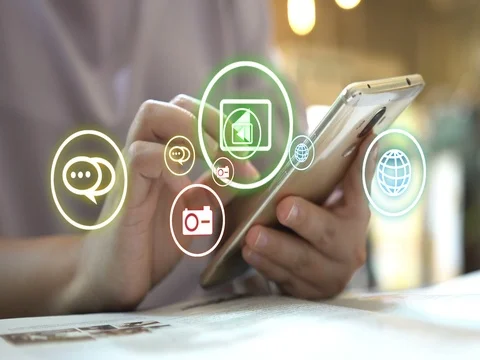 Hand touch screen smart phone, social icons interface on screen. Stock Footage 80363726