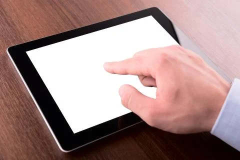 Hand on a touch screen of tablet pc Foto stock