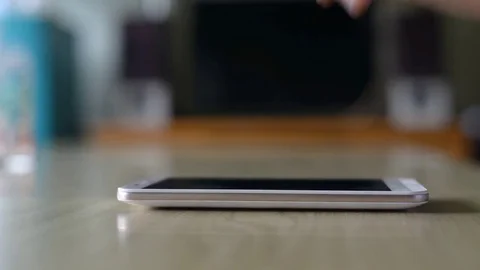 Hand touch on smart phone touchscreen. Stock Footage 77829059