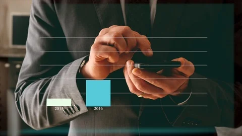 Hand touches a display that interacts with virtual display of growth data. Stock Footage 101974917
